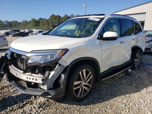 Photo 2 from auction – 2016 HONDA PILOT ELIT with VIN 5FNYF6H0XGB055012