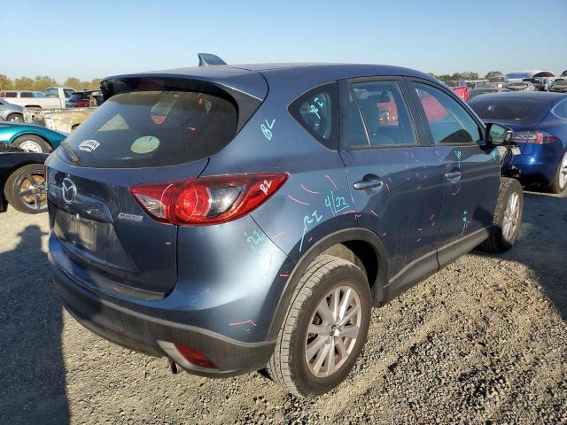 Photo 4 from auction – 2014 MAZDA CX-5 SPORT with VIN JM3KE2BE3E0399497