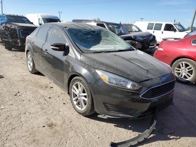 FORD FOCUS SE 2015 with VIN 1FADP3F20FL379957 - Photo from auction
