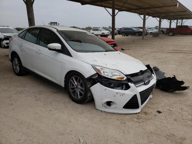FORD FOCUS SE 2014 with VIN 1FADP3F24EL337547 - Photo from auction