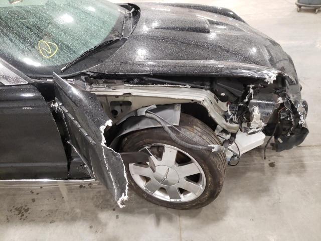 Photo 9 from auction – 2003 FORD THUNDERBIR with VIN 1FAHP60A73Y114650