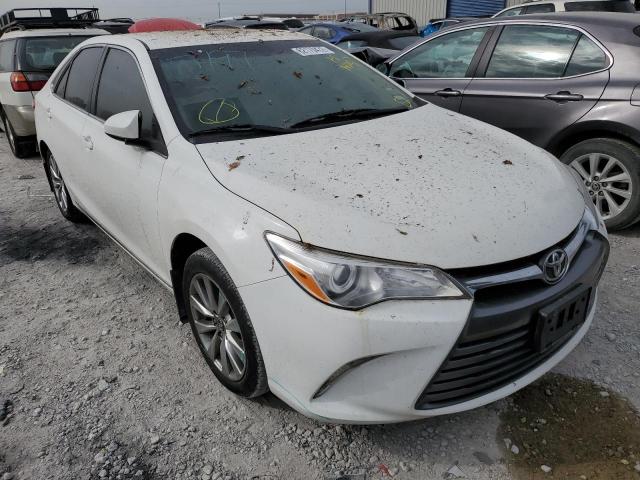 TOYOTA CAMRY LE 2017 with VIN 4T1BF1FK0HU751203 - Photo from auction