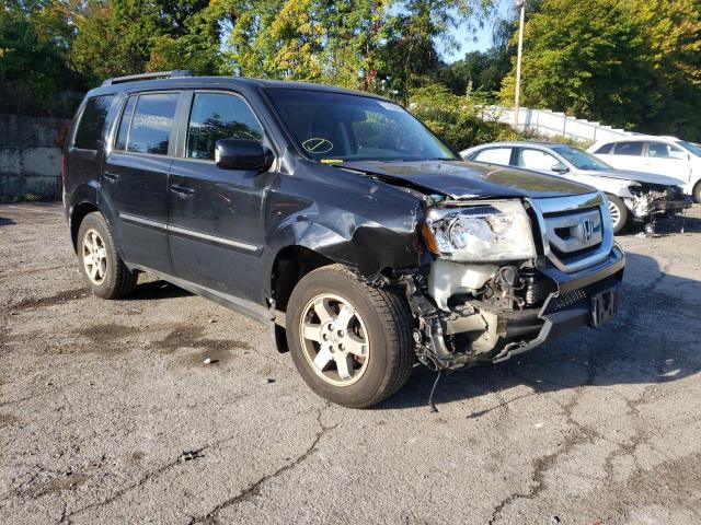 HONDA PILOT TOUR 2010 with VIN 5FNYF4H92AB033449 - Photo from auction