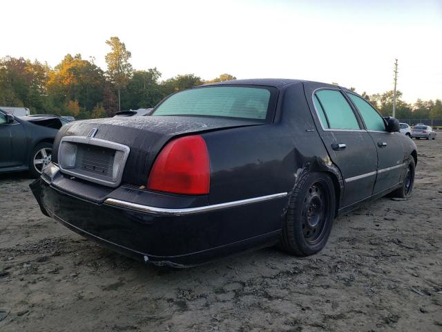 Photo 4 from auction – 2003 LINCOLN TOWN CAR E with VIN 1LNHM81W13Y605168