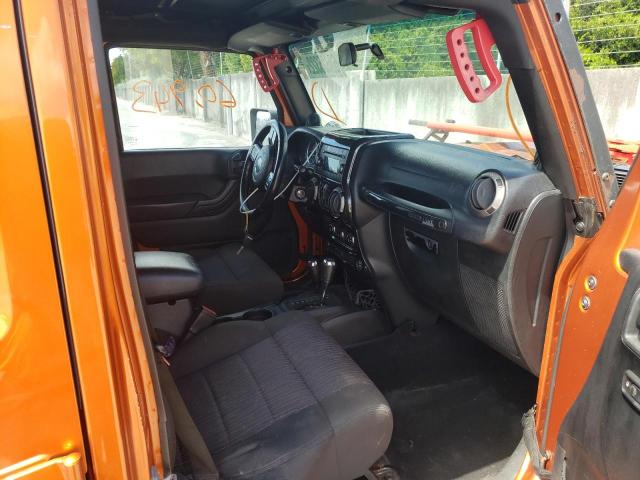 Photo 5 from auction – 2011 JEEP WRANGLER U with VIN 1J4BA3H15BL629656