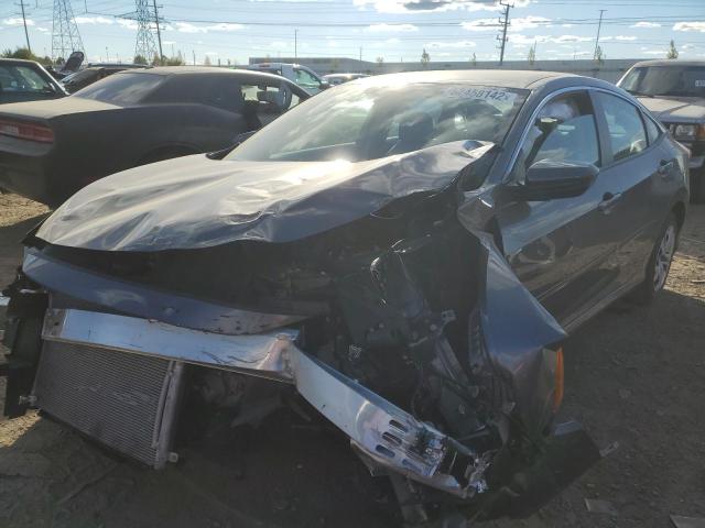 Photo 2 from auction – 2018 HONDA CIVIC LX with VIN 19XFC2F59JE016917