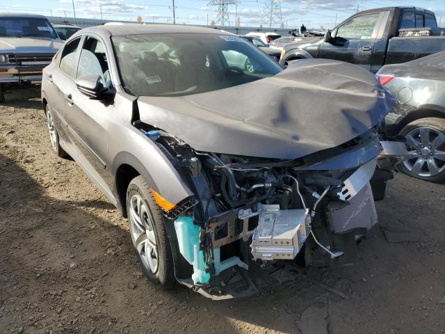 HONDA CIVIC LX 2018 with VIN 19XFC2F59JE016917 - Photo from auction