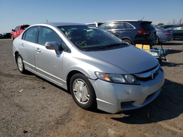 HONDA CIVIC HYBR 2010 with VIN JHMFA3F28AS000074 - Photo from auction