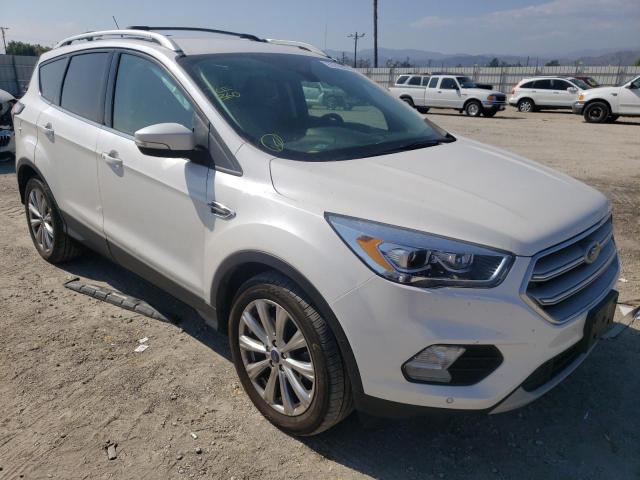 FORD ESCAPE TIT 2018 with VIN 1FMCU0J90JUC86727 - Photo from auction