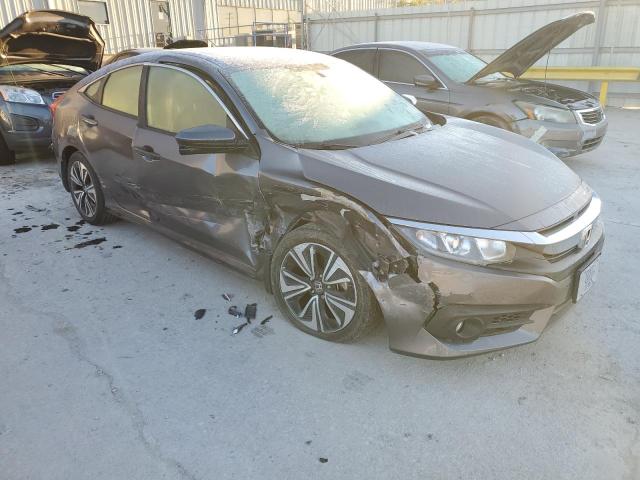 HONDA CIVIC EX 2018 with VIN JHMFC1F35JX009597 - Photo from auction