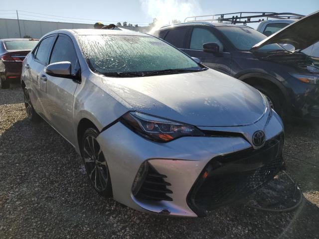 TOYOTA COROLLA L 2017 with VIN 5YFBURHE5HP661008 - Photo from auction