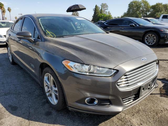 FORD FUSION TIT 2016 with VIN 3FA6P0SU0GR320554 - Photo from auction