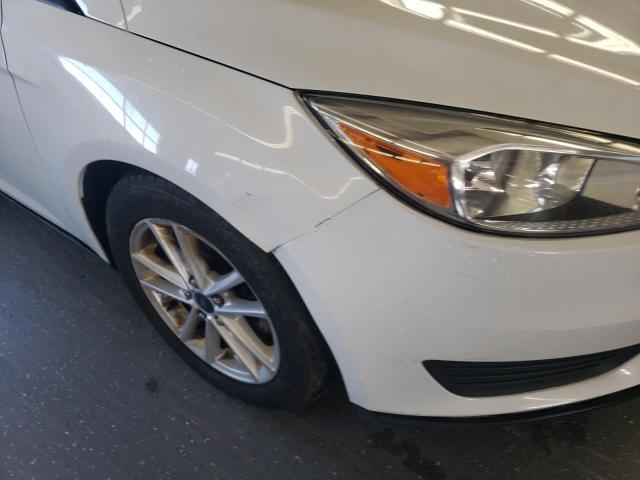 Photo 9 from auction – 2015 FORD FOCUS SE with VIN 1FADP3F22FL233446