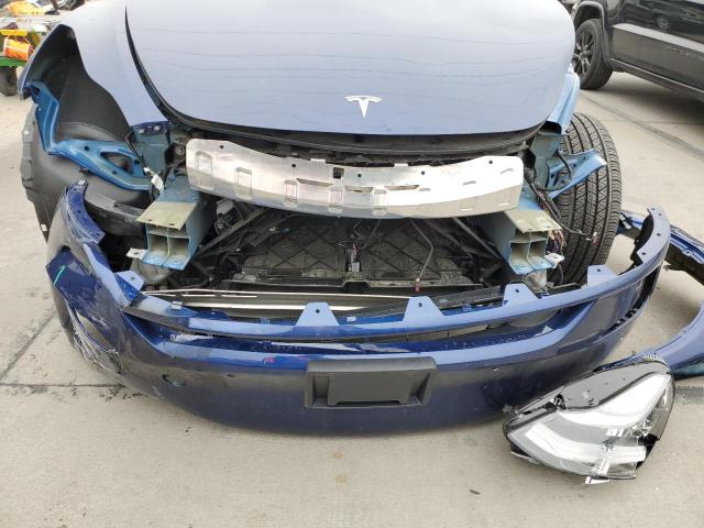 Photo 9 from auction – 2022 TESLA MODEL Y with VIN 7SAYGDEE2NF437052