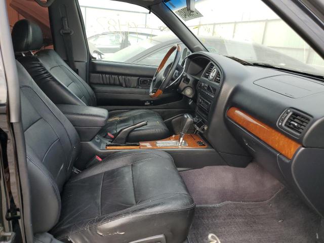 Photo 5 from auction – 2001 INFINITI QX4 with VIN JNRDR09Y61W217969