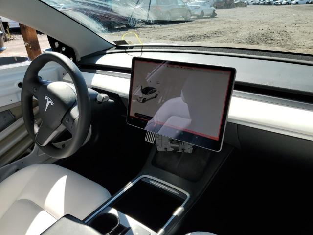 Photo 7 from auction – 2021 TESLA MODEL 3 with VIN 5YJ3E1EA1MF019332