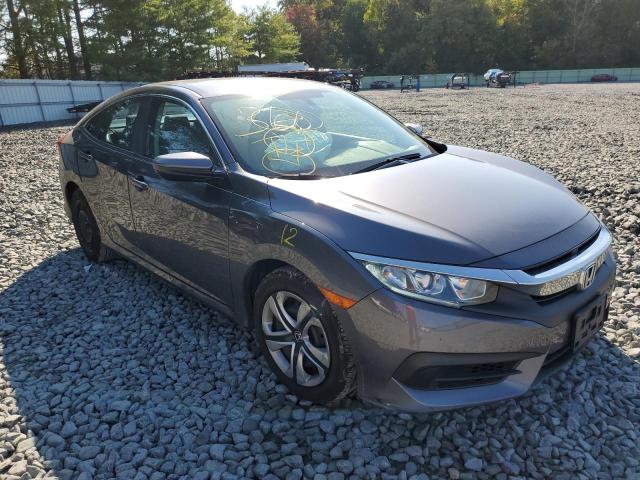 HONDA CIVIC LX 2018 with VIN 2HGFC2F59JH580170 - Photo from auction