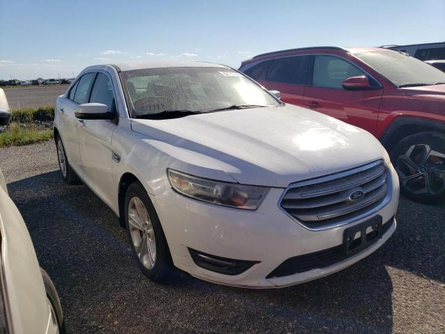 FORD TAURUS SEL 2013 with VIN 1FAHP2E84DG166100 - Photo from auction