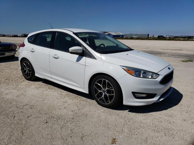 FORD FOCUS SE 2015 with VIN 1FADP3K21FL310698 - Photo from auction