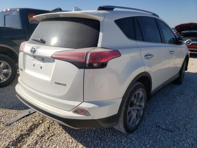 Photo 4 from auction – 2018 TOYOTA RAV4 LIMIT with VIN JTMYFREV5JJ200667