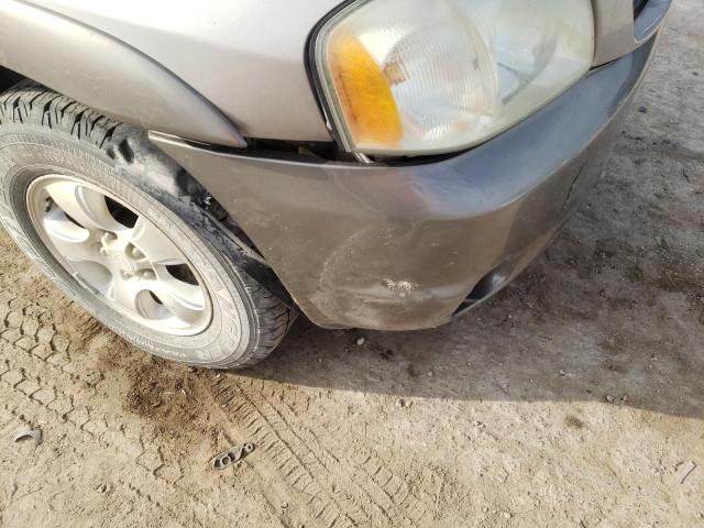 Photo 9 from auction – 2002 MAZDA TRIBUTE LX with VIN 4F2YU08112KM23424
