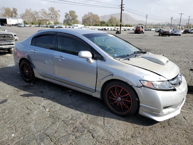 Photo 4 from auction – 2010 HONDA CIVIC LX with VIN 19XFA1F51AE077677