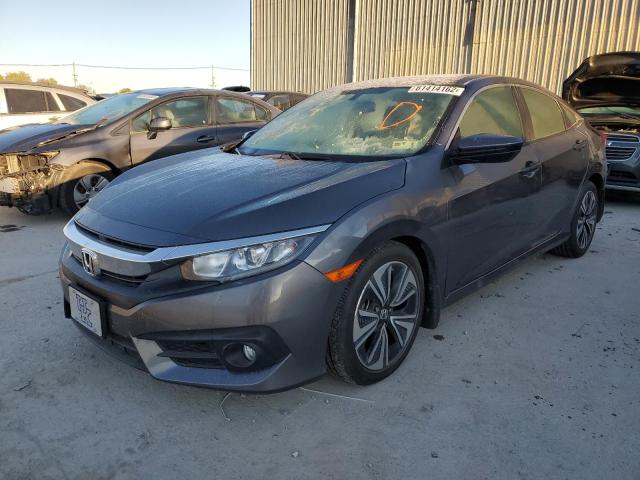 Photo 2 from auction – 2018 HONDA CIVIC EX with VIN JHMFC1F35JX009597