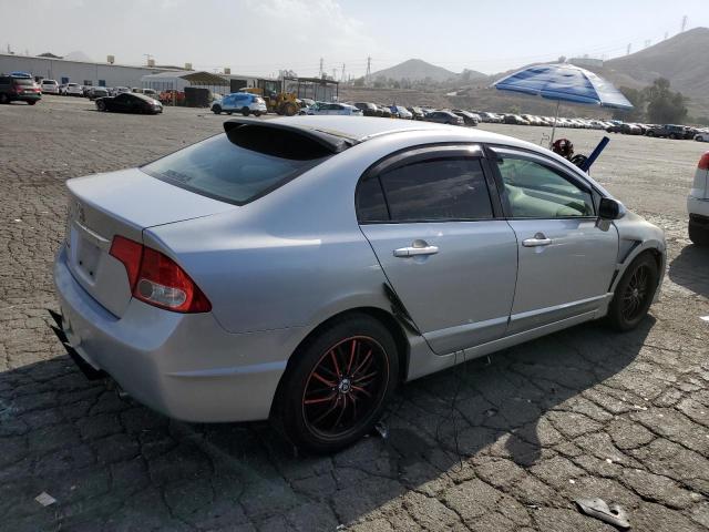 Photo 3 from auction – 2010 HONDA CIVIC LX with VIN 19XFA1F51AE077677