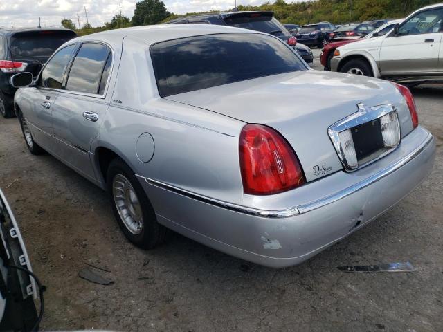 Photo 9 from auction – 1999 LINCOLN TOWN CAR E with VIN 1LNHM81W3XY685336