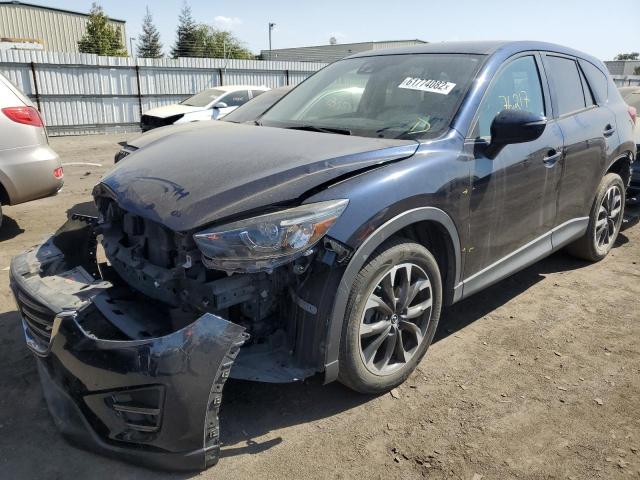 Photo 2 from auction – 2016 MAZDA CX-5 GT with VIN JM3KE4DY0G0900674