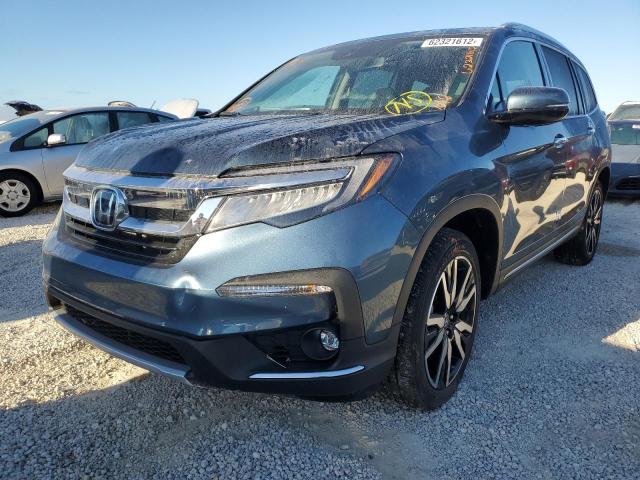 Photo 2 from auction – 2020 HONDA PILOT TOUR with VIN 5FNYF5H67LB025975