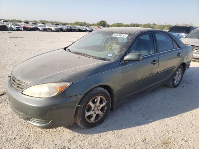 TOYOTA CAMRY LE 2002 with VIN JTDBE32K620122584 - Photo from auction