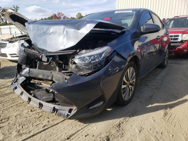 Photo 2 from auction – 2017 TOYOTA COROLLA L with VIN 5YFBURHE1HP658896
