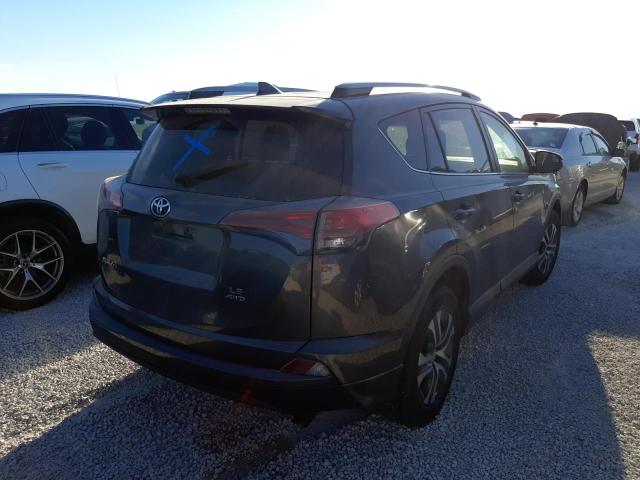 Photo 4 from auction – 2017 TOYOTA RAV4 LE with VIN JTMBFREV1HJ128625