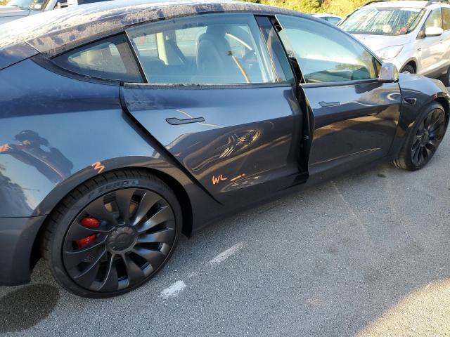 Photo 9 from auction – 2022 TESLA MODEL 3 with VIN 5YJ3E1EC3NF316119