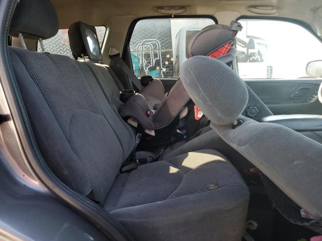 Photo 6 from auction – 2003 MAZDA TRIBUTE LX with VIN 4F2YZ04143KM55891