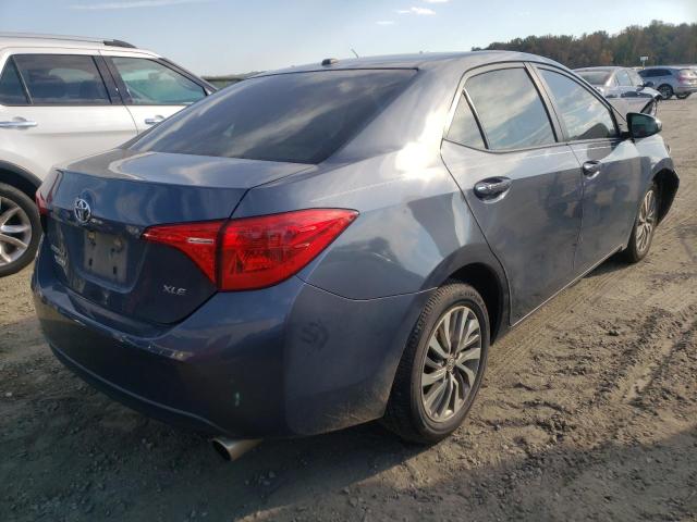 Photo 4 from auction – 2017 TOYOTA COROLLA L with VIN 5YFBURHE1HP658896