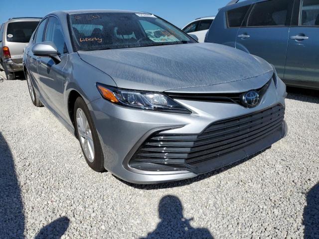 TOYOTA CAMRY LE 2021 with VIN 4T1C11AK2MU445754 - Photo from auction
