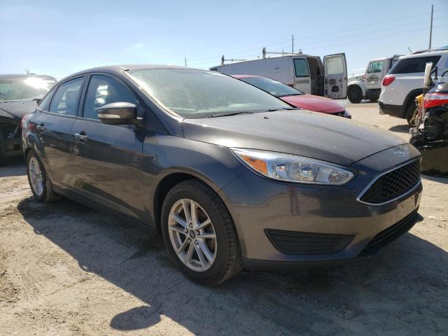 FORD FOCUS SE 2015 with VIN 1FADP3F23FL335919 - Photo from auction