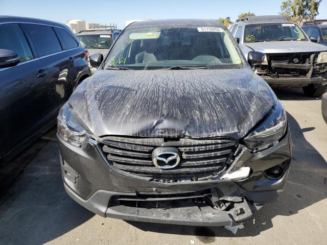 Photo 9 from auction – 2016 MAZDA CX-5 GT with VIN JM3KE2DY7G0611571