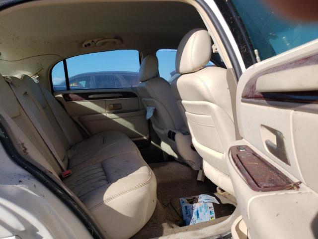 Photo 6 from auction – 2004 LINCOLN TOWN CAR E with VIN 1LNHM81W94Y654359