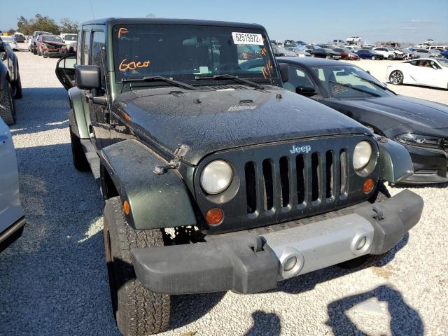 JEEP WRANGLER U 2011 with VIN 1J4BA5H13BL568304 - Photo from auction
