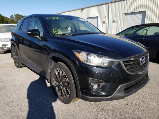 MAZDA CX-5 GT 2016 with VIN JM3KE2DY3G0676899 - Photo from auction