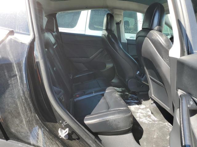 Foto 6 de la subasta – 2022 TESLA MODEL Y con VIN 7SAYGDEF9NF307228