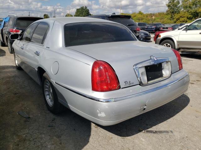 Photo 3 from auction – 1999 LINCOLN TOWN CAR E with VIN 1LNHM81W3XY685336