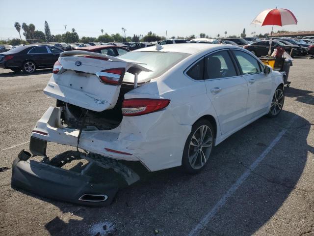 Photo 4 from auction – 2019 FORD FUSION TIT with VIN 3FA6P0D92KR256888