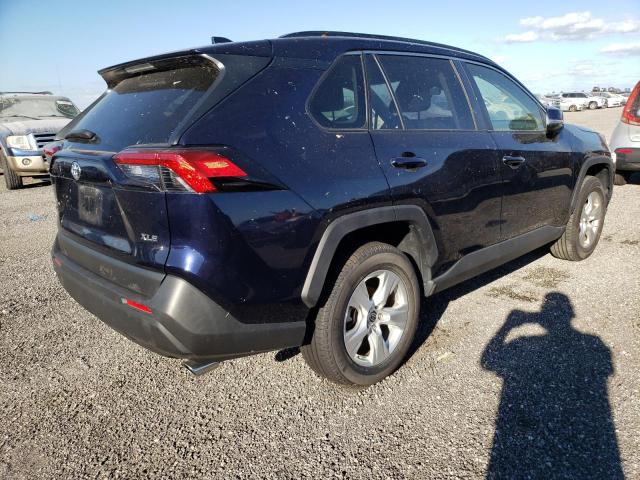 Photo 4 from auction – 2019 TOYOTA RAV4 XLE with VIN JTMW1RFV4KD036476