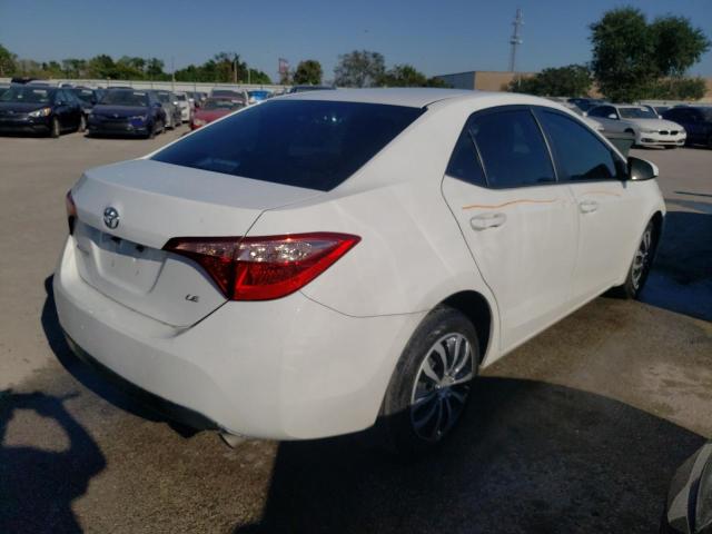 Photo 4 from auction – 2018 TOYOTA COROLLA L with VIN 5YFBURHEXJP799696