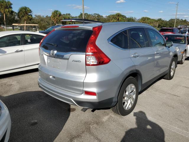 Photo 4 from auction – 2015 HONDA CR-V EXL with VIN 5J6RM4H71FL028976