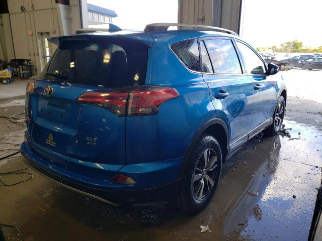 Photo 4 from auction – 2017 TOYOTA RAV4 XLE with VIN JTMRFREV7HJ715250